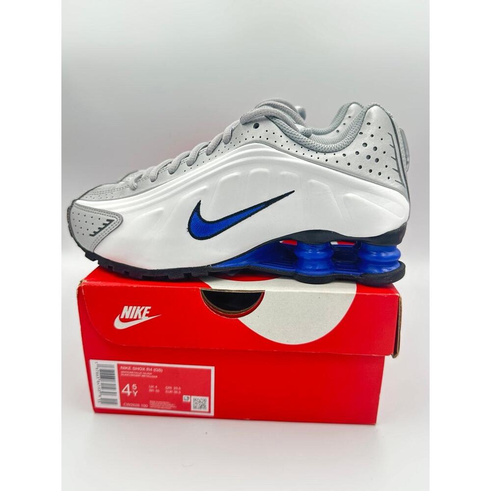 Nike Kids White and Gray Sneakers with Blue Swoosh